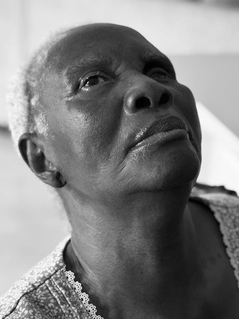 Mami in a black-and-white close-up portrait